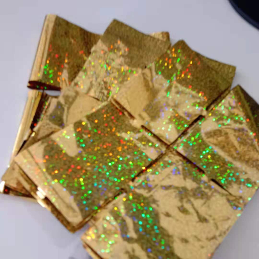 ม่านฟอยล์ foil curtain สี laser gold  (แบบเหลี่ยม)